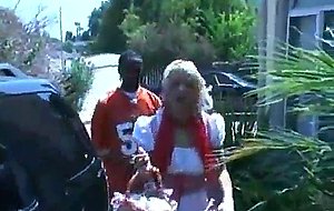 Blond whore fucks two big giant dicks
