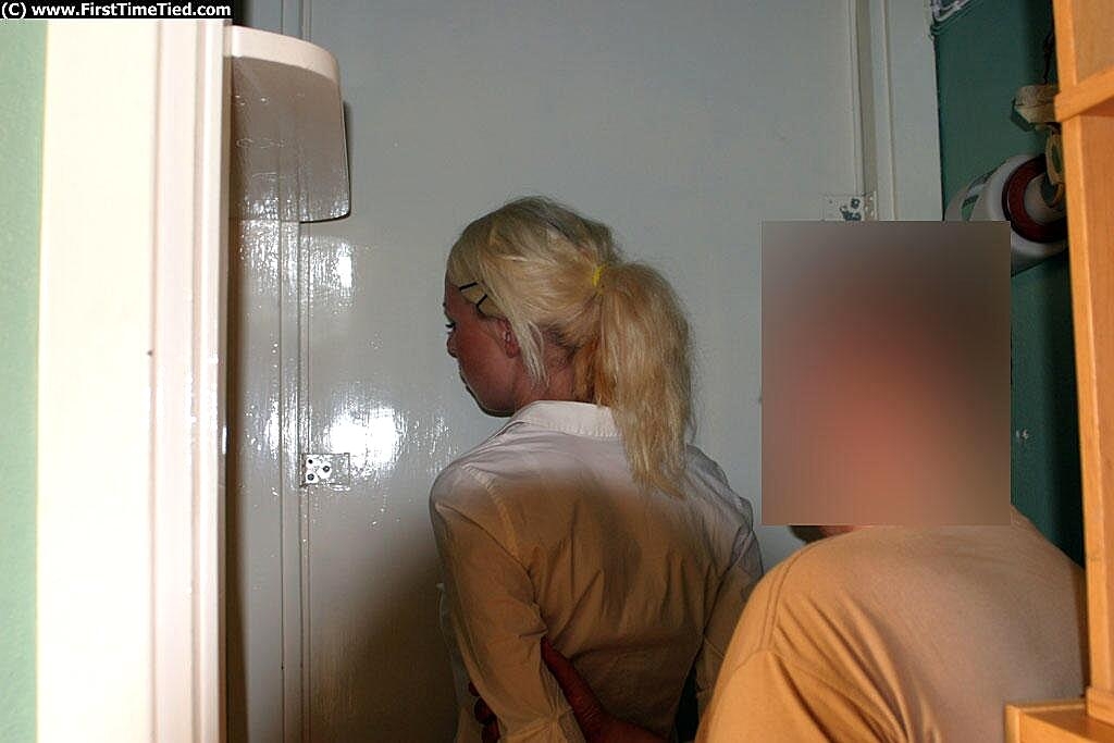 Blonde Girl In A Black Skirt And White Bondage, Clothed, Non-Nude, Police, Smoking