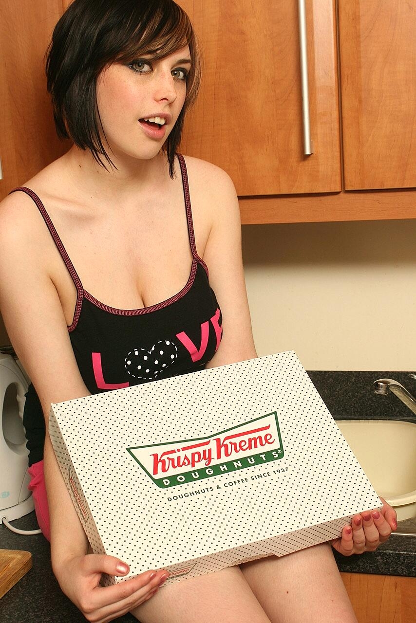 Short fatty Louisa May strips & shows her big tits while eating donuts