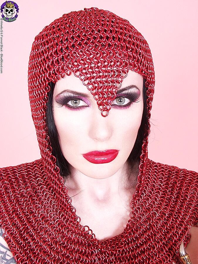 Busty Chick Morrigan Hel Licks A Dagger While Wearing Chain Mail And Otk Boots Big-Tits, Cosplay, Fetish, Mature, Milf